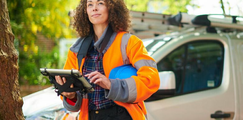 Tradesperson using digital tablet